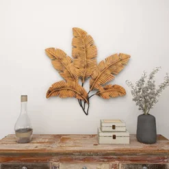 Metal Leaf Clutter Palm Wall Decor With Distressed Textured Brown - Olivia & May -Home Decor Store GUEST cba96d96 8e71 4875 8356 2a9f4522d77f